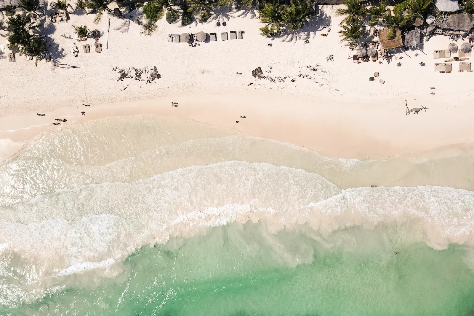 Aerial view of a turquoise beach in Tulum